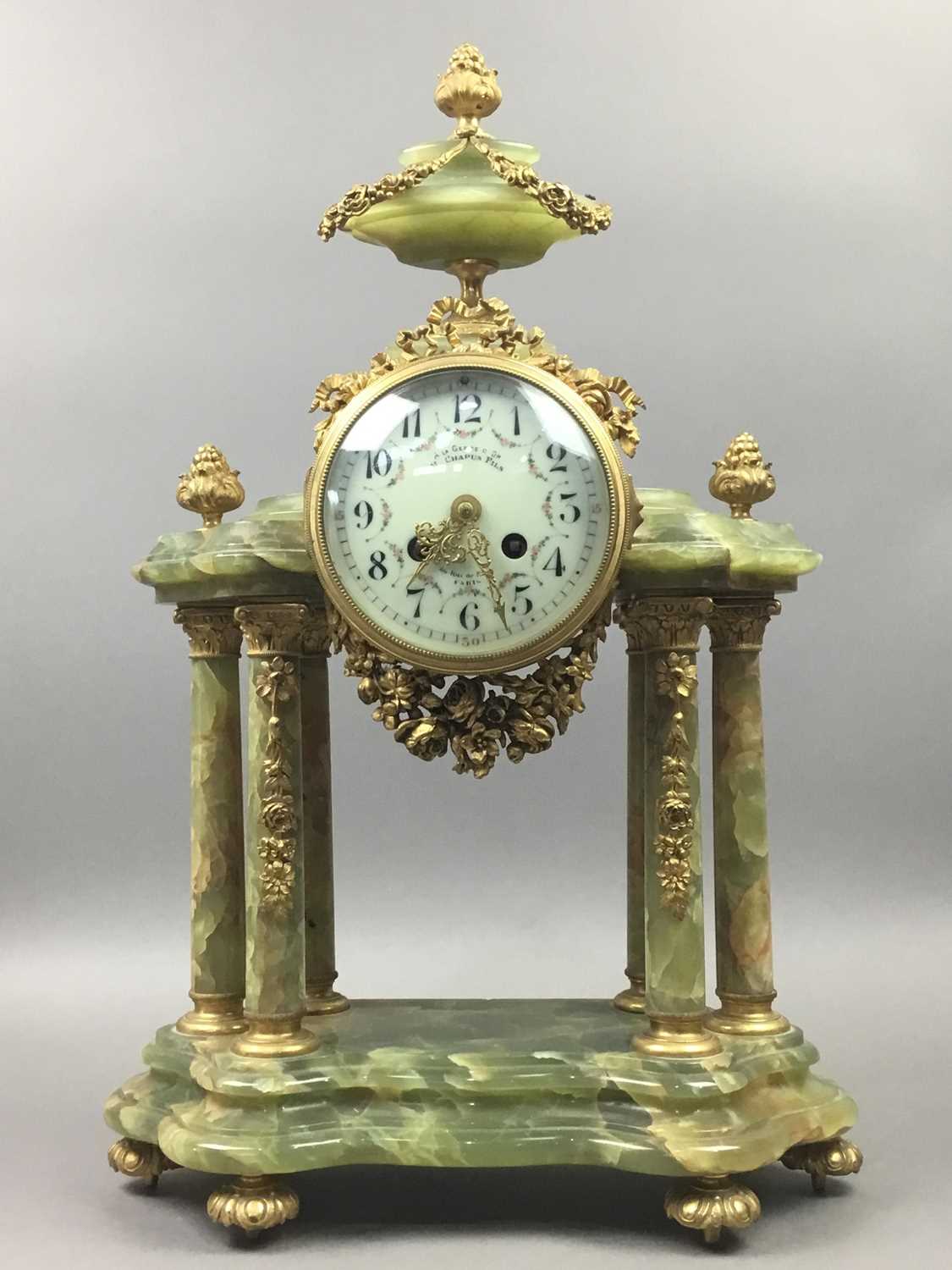 Lot 666 - A 19TH CENTURY FRENCH ONYX MANTEL CLOCK BY CHAPUS FILS PARIS