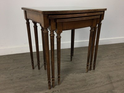 Lot 522 - A NEST OF THREE MAHOGANY TABLES