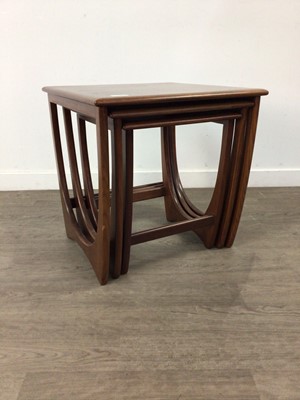 Lot 495 - A MID CENTURY G-PLAN TEAK NEST OF THREE TABLES