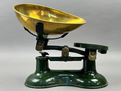 Lot 546 - A SET OF CAST IRON AND BRASS SCALES
