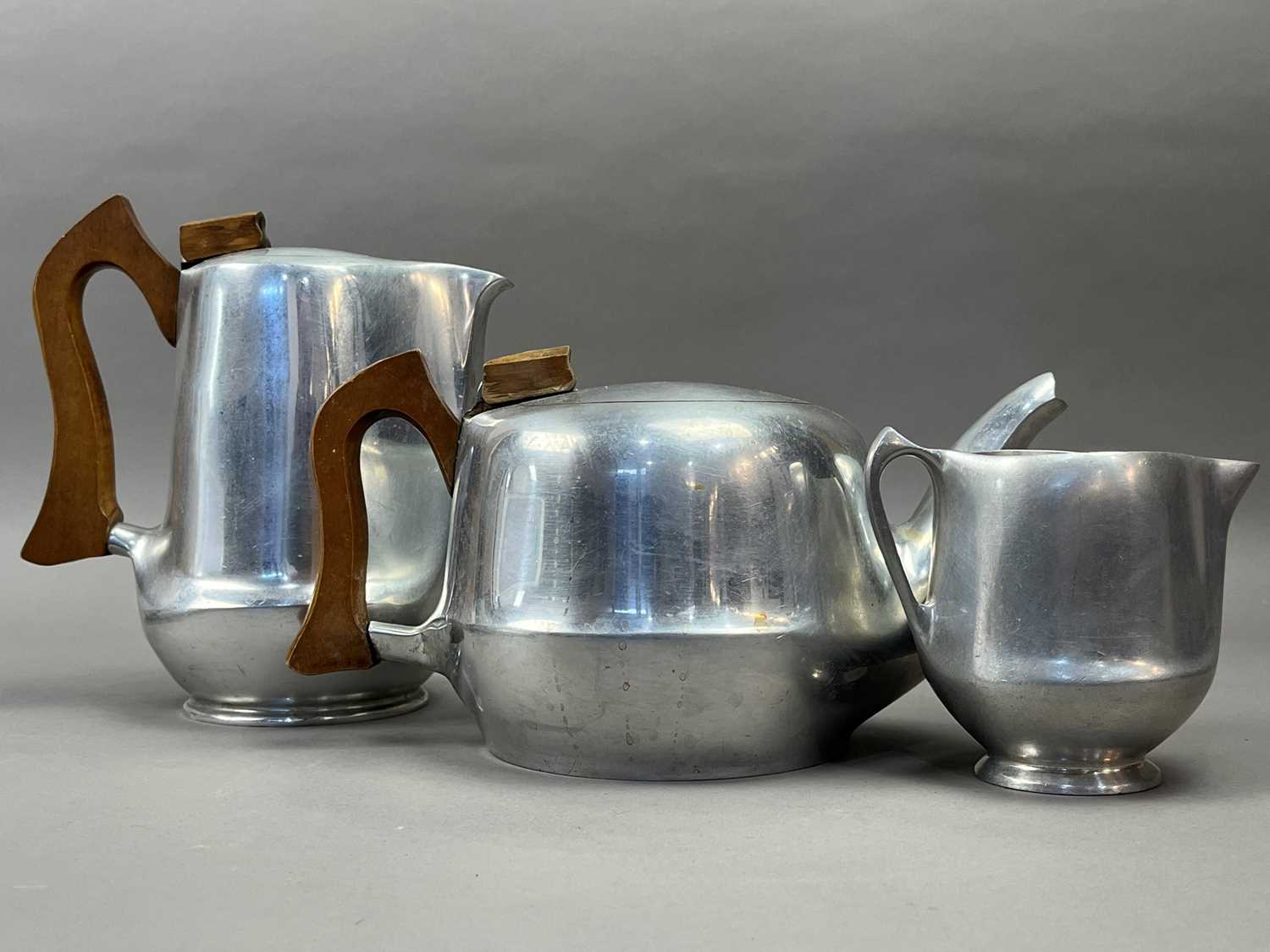 Lot 505 - A PIQUOT WARE FOUR PIECE TEA SERVICE ON TRAY