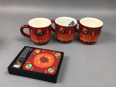 Lot 640 - POOLE POTTERY FOUR VOLCANIC RANGE MUGS