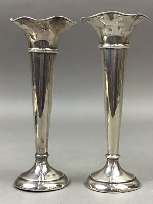 Lot 205A - A PAIR OF SILVER VASES