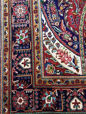 Lot 868 - A PERSIAN TABRIZ RUG