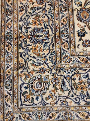 Lot 874 - A PERSIAN KASHAN RUG