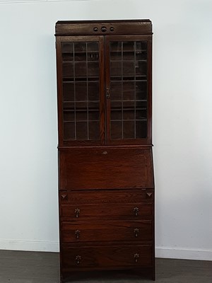 Lot 125A - AN OAK BUREAU BOOKCASE