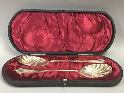 Lot 5 - A PAIR OF SILVER PLATE CLAMSHELL SERVING SPOONS