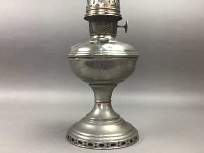 Lot 131 - AN OIL LAMP