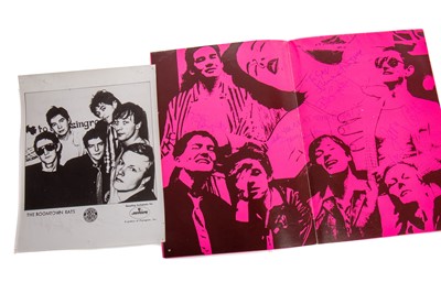 Lot 1053 - THE BOOMTOWN RATS - SIGNED PHOTOGRAPH AND POSTERGRAMME WITH A DOUBLE-SIDED POSTER