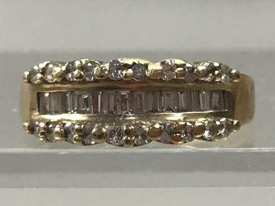 Lot 29 - A NINE CARAT GOLD AND DIAMOND SET RING