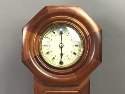 Lot 68 - A REPRODUCTION WALL CLOCK