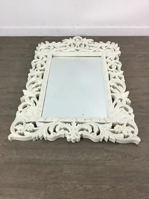 Lot 84 - A PAIR OF CARVED CREAM PAINTED WALL MIRRORS