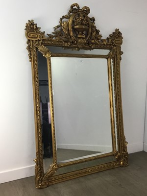 Lot 886 - A LARGE GILT WALL MIRROR IN THE LOUIS XVI TASTE