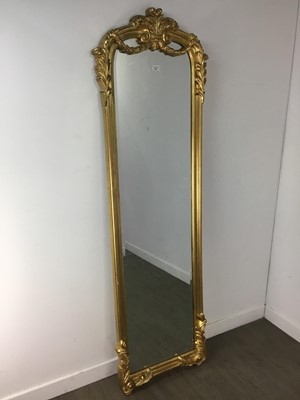 Lot 888 - A GILT WALL MIRROR IN THE FRENCH TASTE