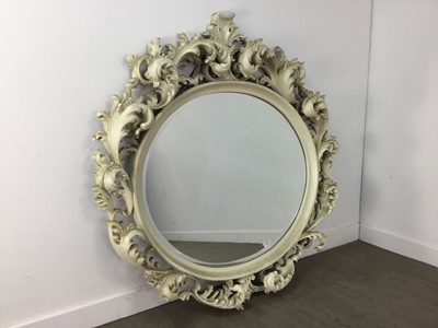 Lot 889 - A CIRCULAR WALL MIRROR IN THE ROCOCO TASTE