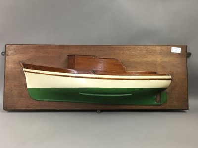 Lot 39 - A DECORATIVE WOODEN HALF HULL YACHT MODEL