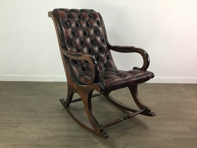 Lot 98 - A MAHOGANY FRAMED OXBLOOD LEATHER ROCKING CHAIR