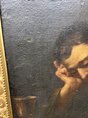 Lot 413 - READING MAN, AN OIL IN THE MANNER OF CARAVAGGIO