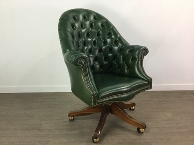 Lot 101 - A GREEN LEATHER BUTTON BACK SWIVEL CHAIR