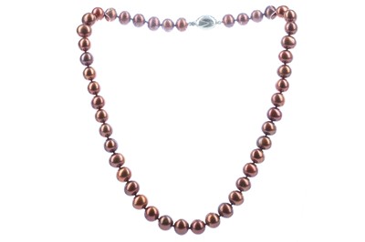 Lot 1124 - A STRING OF CHOCOLATE PEARLS