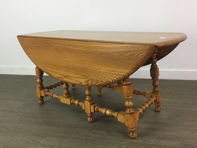 Lot 111 - AN ERCOL DROP LEAF COFFEE TABLE