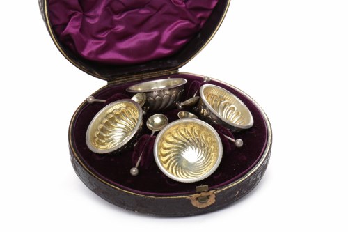 Lot 15 - SET OF FOUR VICTORIAN SILVER AND PARCEL GILT...