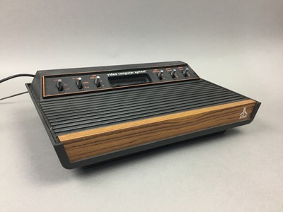 Lot 997A - AN ATARI 2600 VCS, JOYSTICK AND GAMES