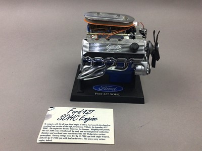 Lot 136 - MODEL OF A FORD 427 ENGINE, AND THREE AMERICAN CAR PLATES