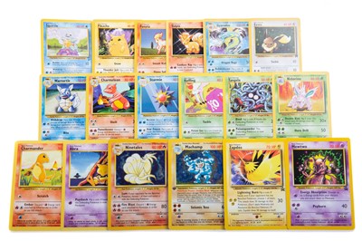 Lot 998A - A LOT OF POKEMON BASE SET TRADING CARDS AND STICKERS