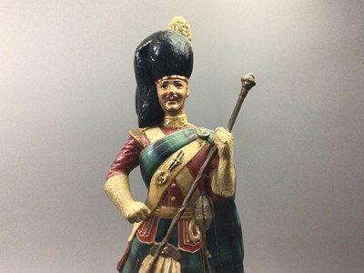 Lot 153 - A DEWAR'S WHITE LABEL ADVERTISING FIGURE OF A PIPER AND ANOTHER FIGURE