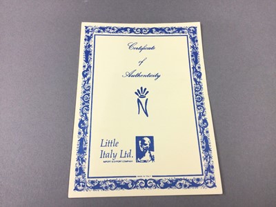 Lot 203 - A CAPODIMONTE PORCELAIN FIGURE 'WATERING THE WINE'