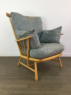Lot 178 - AN ERCOL COMB-BACK EASY CHAIR