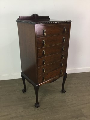 Lot 219 - A MAHOGANY MUSIC CABINET