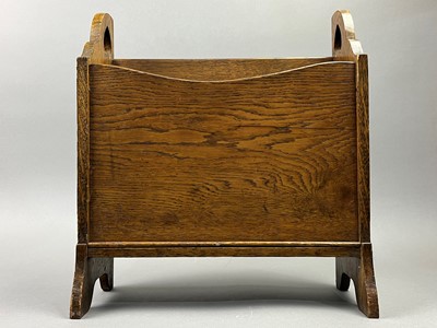 Lot 217 - AN OAK ARTS & CRAFTS MAGAZINE RACK AND A CANDLE STAND