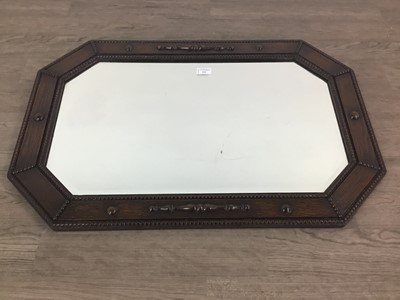 Lot 211 - AN EARLY 20TH CENTURY OAK WALL MIRROR