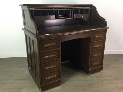 Lot 207 - AN OAK TAMBOUR DESK