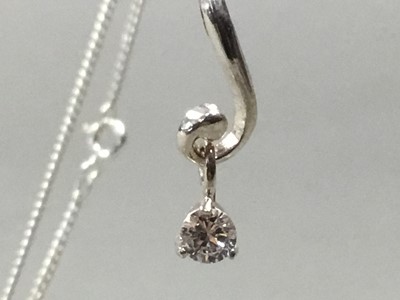 Lot 238 - A LOT OF ELEVEN VINTAGE SILVER PENDANTS AND CHAINS