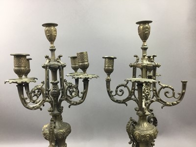 Lot 278 - A PAIR OF BRONZE CANDLESTICKS