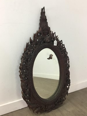 Lot 280 - AN EAST ASIAN OVAL WALL MIRROR