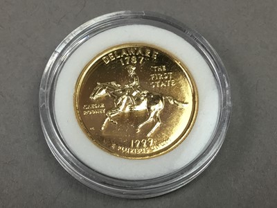 Lot 309 - A CASED SET OF 50 U.S. GOLD PLATED QUARTER DOLLARS