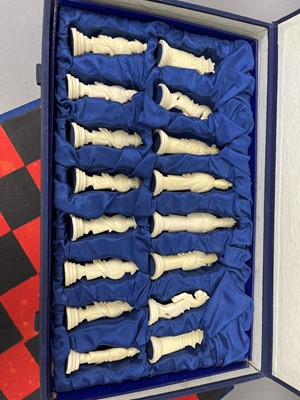 Lot 321 - A CHINESE CARVED BONE FIGURAL CHESS SET