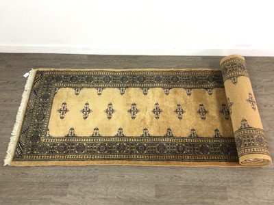 Lot 331 - A BOKHARA RUNNER