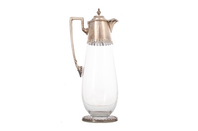 Lot 68 - VICTORIAN SILVER MOUNTED CLEAR GLASS CLARET JUG