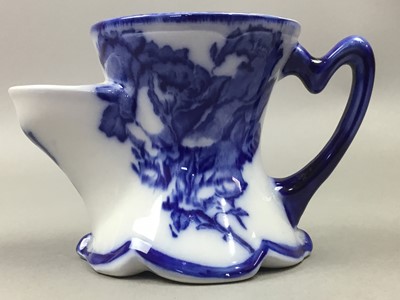 Lot 153 - A BLUE AND WHITE SHAVING MUG