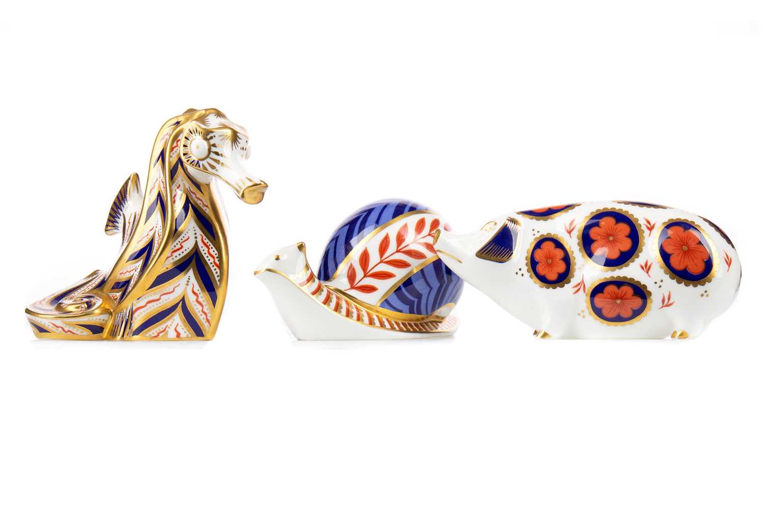 Lot 810 - THREE ROYAL CROWN DERBY PAPERWEIGHTS