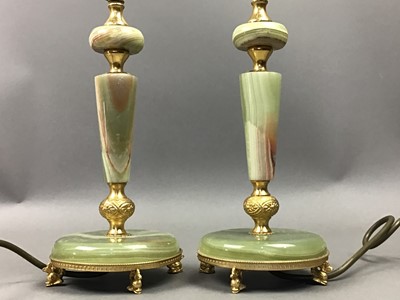 Lot 480 - A PAIR OF ONYX TABLE LAMP BASES AND A MAGNIFYING GLASS ON STAND