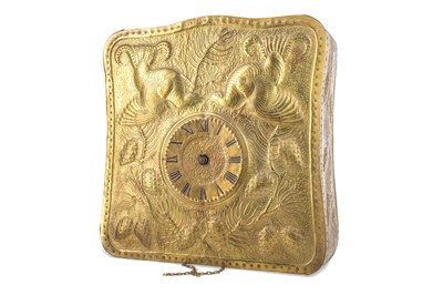 Lot 694 - AN ARTS & CRAFTS HAMMERED BRASS WALL CLOCK