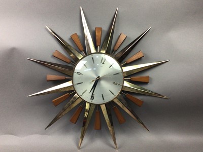 Lot 498 - A METAMIC SUNBURST WALL CLOCK AND OTHER CLOCKS
