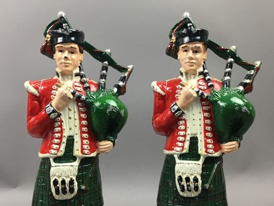 Lot 538 - A PAIR OF BAGPIPER DOORSTOPS, AND TERRIERS