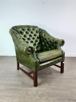 Lot 384 - A GREEN VINYL BUTTON BACK CHAIR